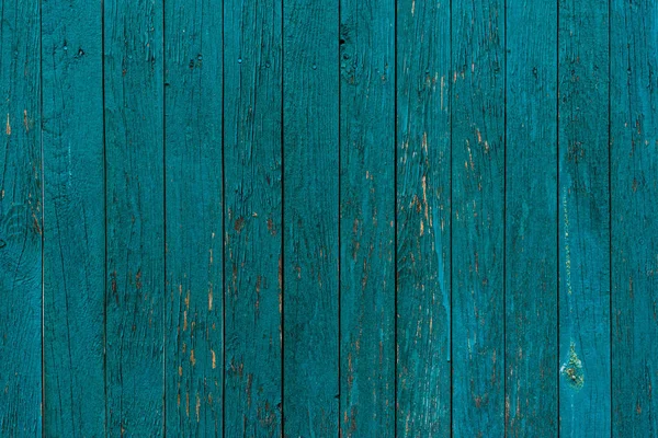 Wooden fence planks background painted in blue — Stock Photo