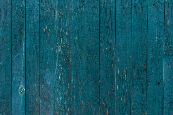 Wooden planks painted in blue background — Stock Photo