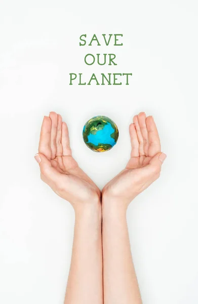 Cropped image of woman holding earth model with sign save our planet isolated on white, earth day concept — Stock Photo