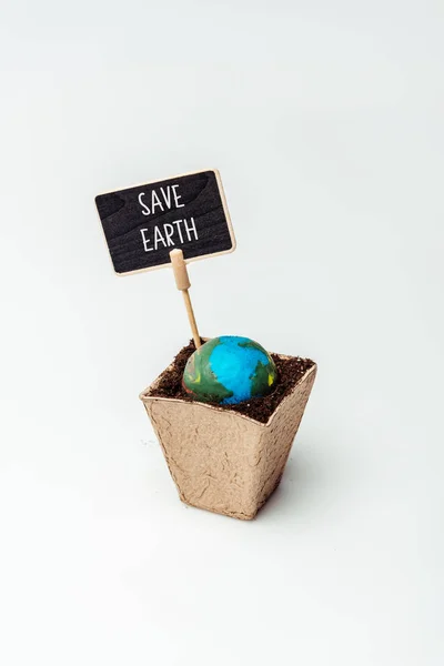 Earth model and sign save earth in flower pot isolated on white, earth day concept — Stock Photo