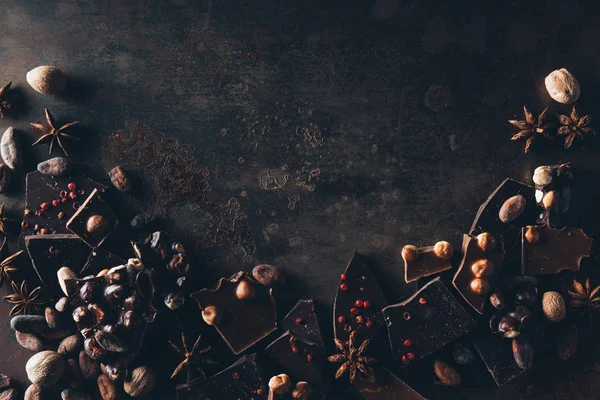 Top view of gourmet assorted chocolate on dark surface — Stock Photo