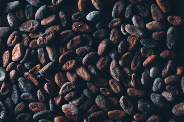 Vista de marco completo de deliciosos granos de cacao fondo - foto de stock