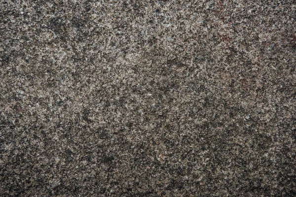 Detailed texture of old granite wall — Stock Photo