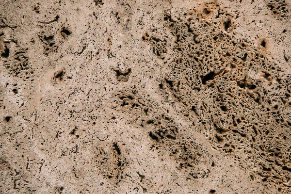 Old beige plaster on wall background — Stock Photo