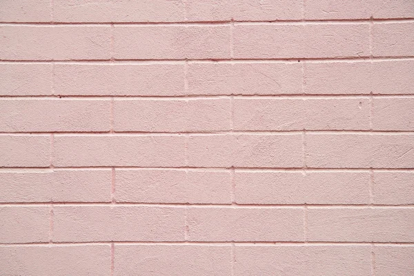 Розовый кирпич стены текстуры фона — стоковое фото