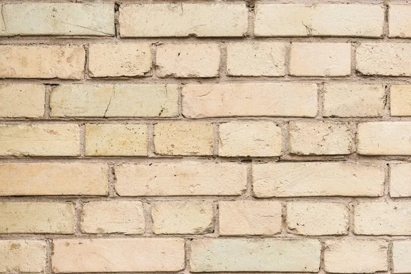 Antiguo muro con ladrillos rotos de fondo - foto de stock