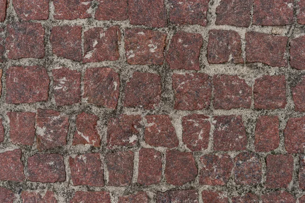 Поверхня дороги з червоних квадратних каменів — стокове фото