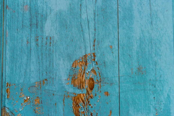 Wooden planks painted in blue background — Stock Photo