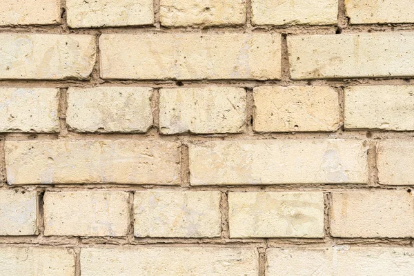 Vieux mur avec fond de briques brisées — Photo de stock