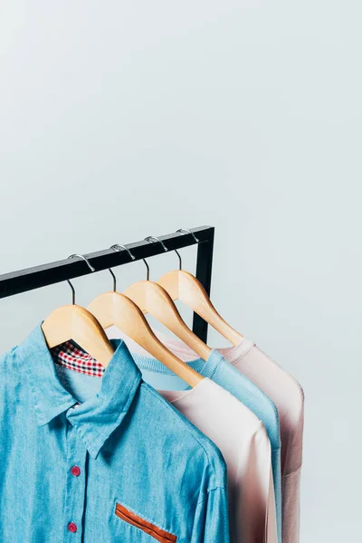 Clothes on hangers isolated on white, summer sale concept — Stock Photo