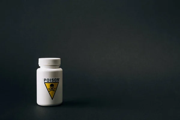 Jar with poison symbol isolated on black — Stock Photo