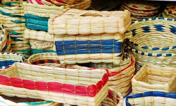 Handmade baskets from plants fiber at craft market in Otavalo, province Imbabura, Ecuador