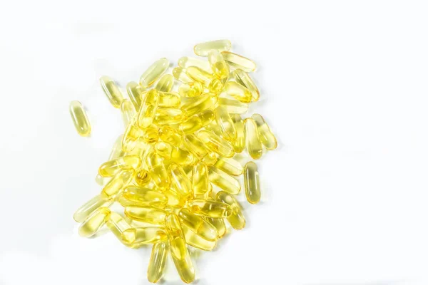 Fish oil capsules on isolated — Stock Photo, Image