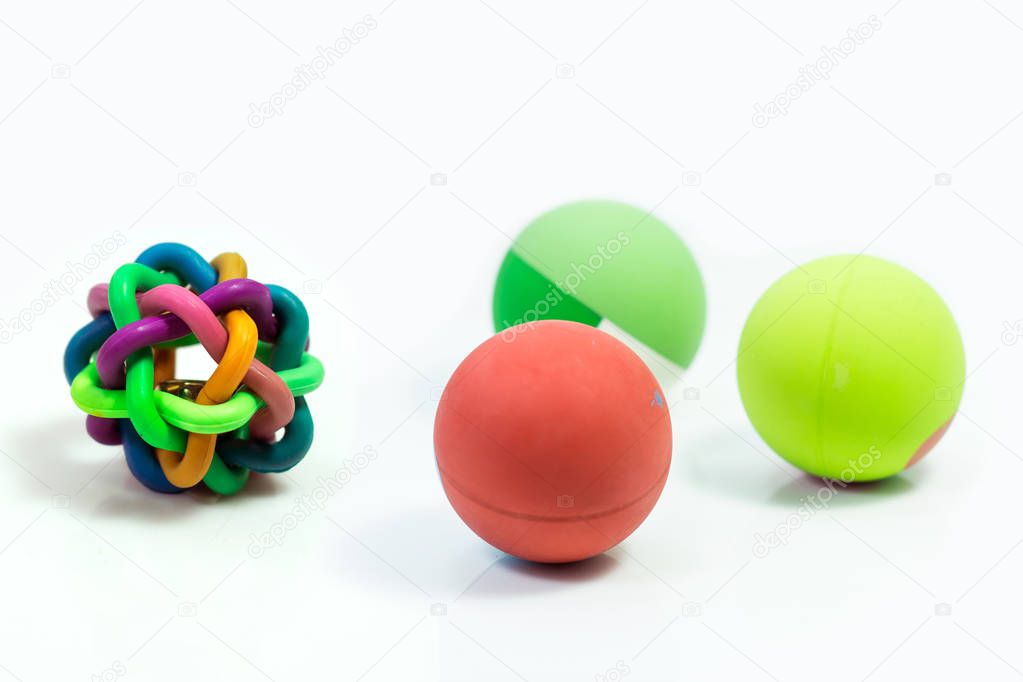 Pet supplies about ball toys for pet isolated on white.