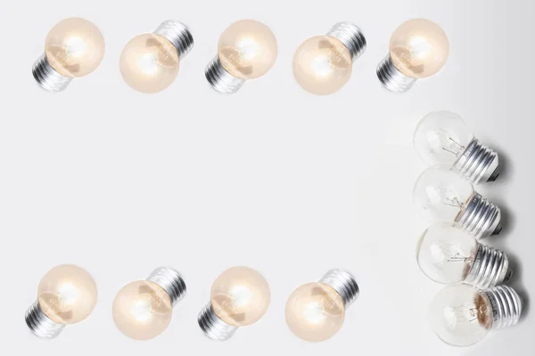 Light bulb on isolated white — Stock Photo, Image