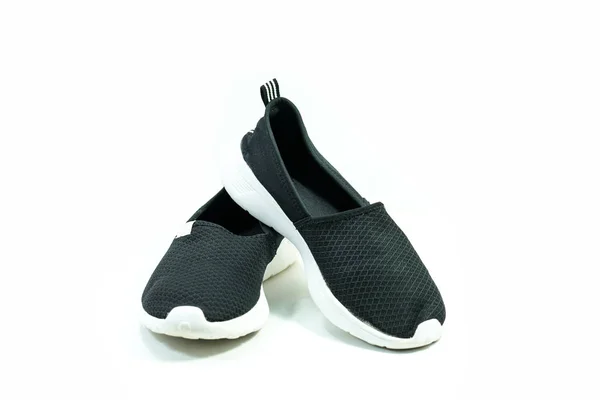 Zapatillas deportivas de color negro aisladas sobre blanco . — Foto de Stock