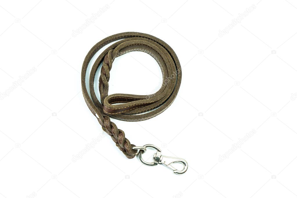 Pet leash of brown leather isolated on white background.  