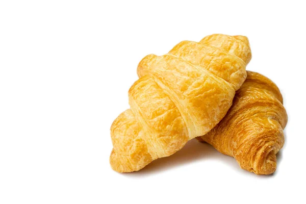 Croissant mit Kopierraum auf isoliertem Weiß — Stockfoto