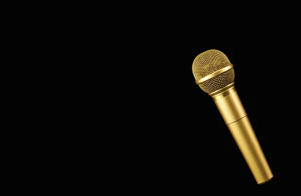 Microfone Dourado Sobre Fundo Preto — Fotografia de Stock