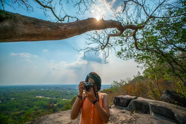 Blurred Photographer with vintage camera for travel concept