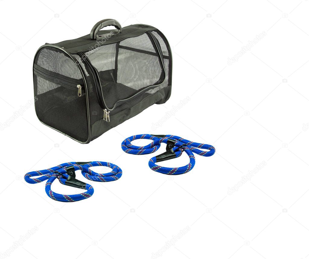 Pet bag and leashes on isolated white background