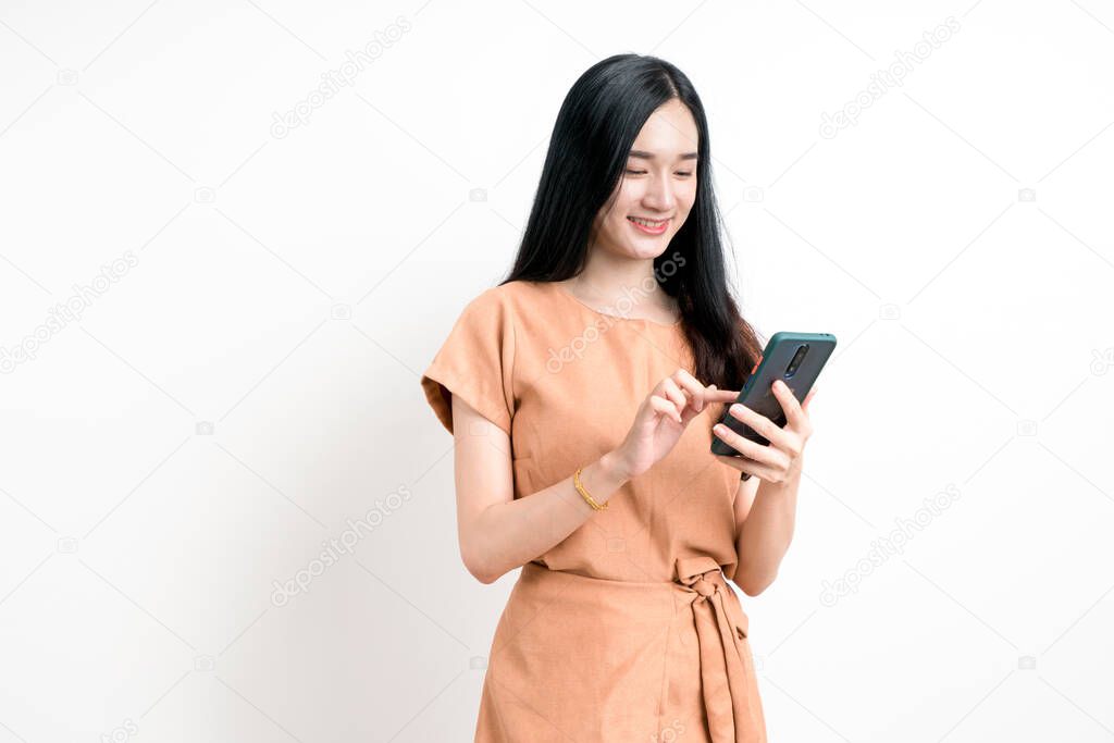 Portrait pretty woman using smartphone for shopping online on white background