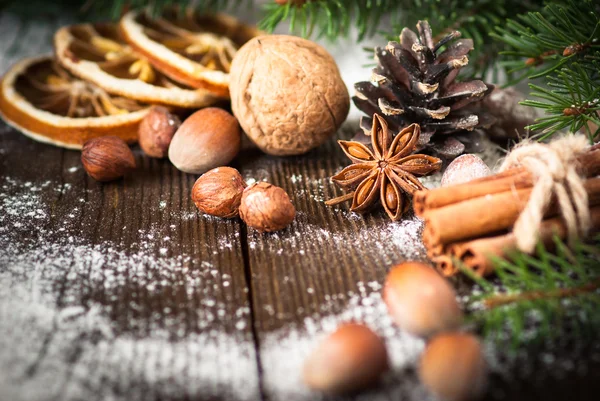 Christmas cookies, spices and nuts — Stock Photo, Image