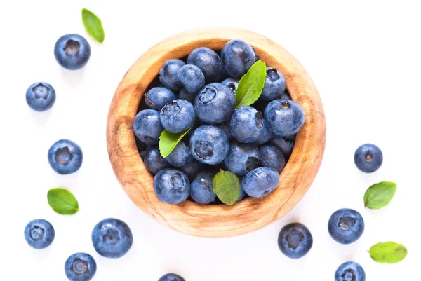 Fresh blueberriaes in wooden bowl. — Stock Photo, Image