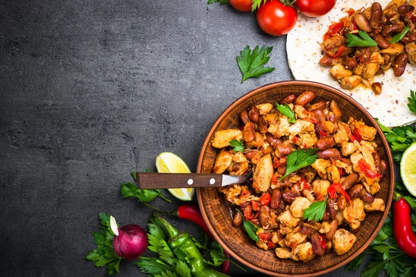 Cooking Mexican taco with meat beans and vegetables. — Stock Photo, Image