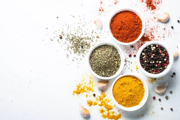 Various spices in a bowls on white. — Stock Photo, Image