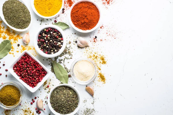 Set of spices in a bowls on white background. — Stock Photo, Image