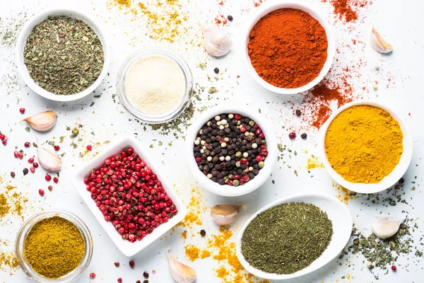 Various spices in a bowls on stone table. — Stock Photo, Image