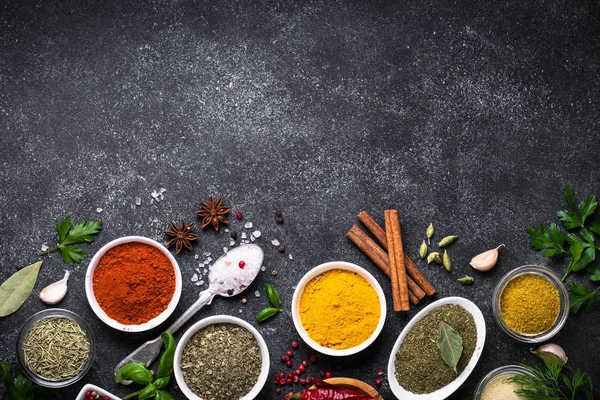Set of Various spices and herbs on black slate table. — Stock Photo, Image