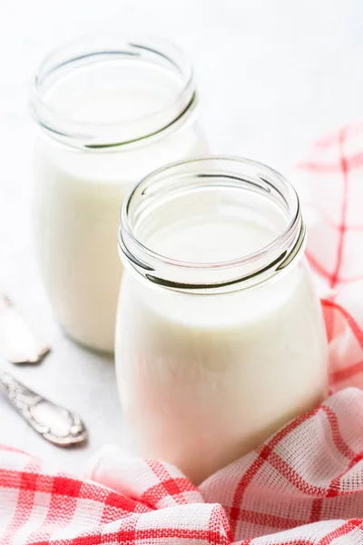 Greek yogurt in glass jars. — Stock Photo, Image