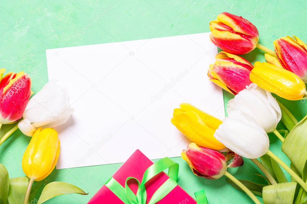 Holiday background or greeting card. Flower and present box. 