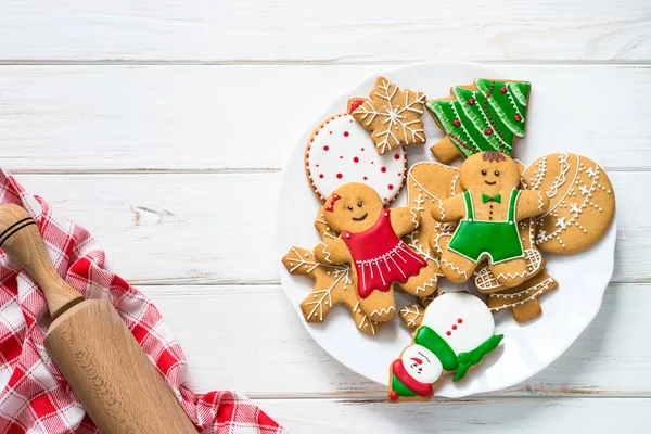 Christmas gingerbread on white table top view. — Stock Photo, Image