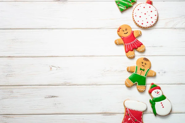 Christmas gingerbread on white table top view. — Stock Photo, Image