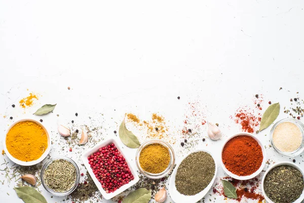 Various spices in a bowls on white. — Stock Photo, Image