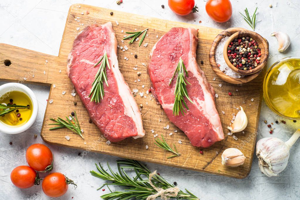 Raw beef striploin steak. 
