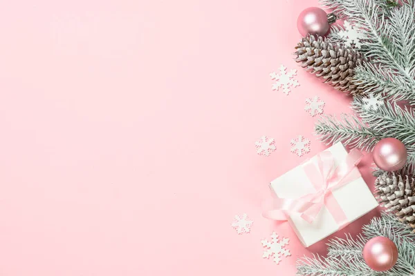 Christmas flat lay background with christmas present box on pink. — Stock Photo, Image