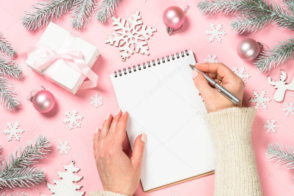 Christmas goals, plans, resolution on pink.