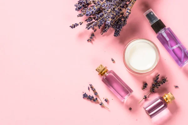 Natural lavender cosmetic on pink. — Stock Photo, Image