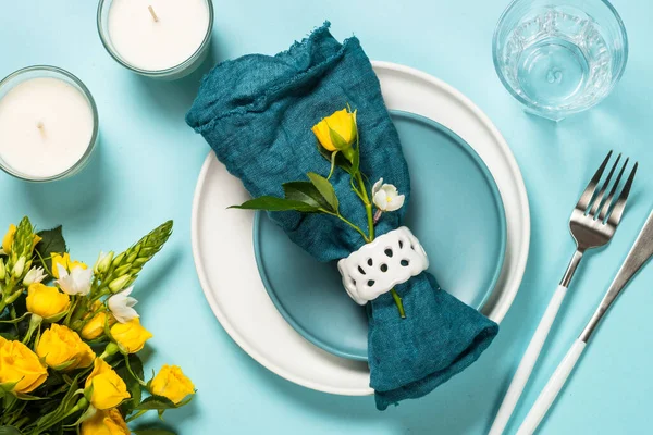 Spring table setting with flower top view. — Stock Photo, Image