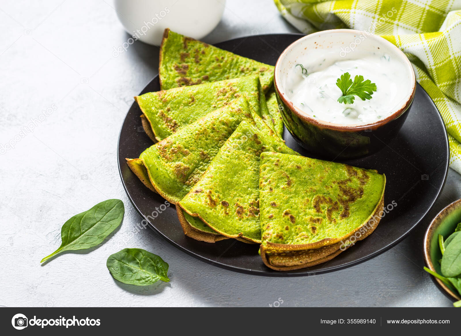 Green pancakes from spinach top view. — Stock Photo © Nadianb 355989140