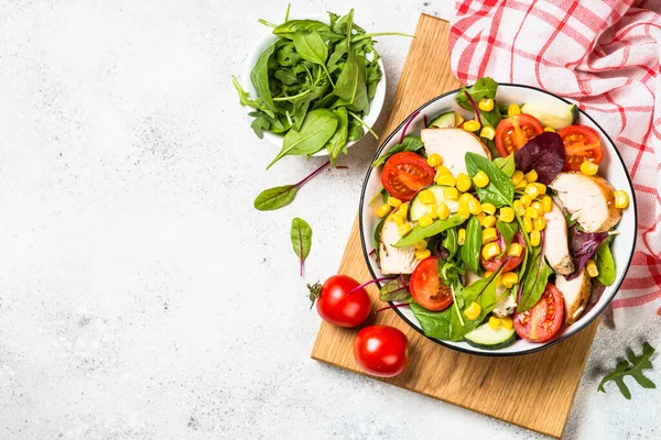 Salad with Chicken and vevetables on white. — Stock Photo, Image