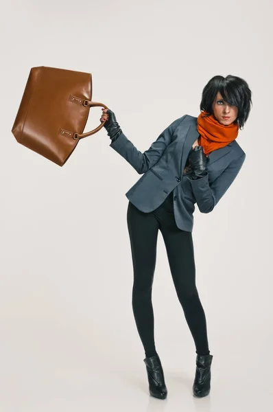 Fashion lady equilibrations with bag — Stock Photo, Image
