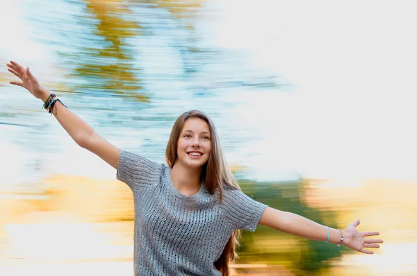 Joyous teen girl in autumn — Stock Photo, Image