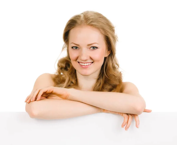 Young woman with blank billboard — Stock Photo, Image