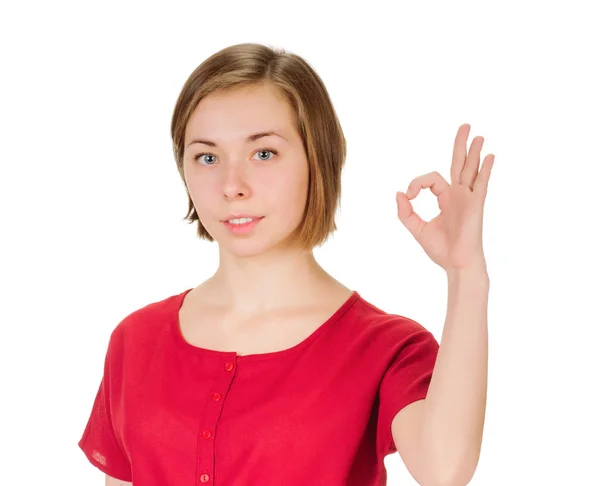 Jovem mulher indicando sinal ok — Fotografia de Stock