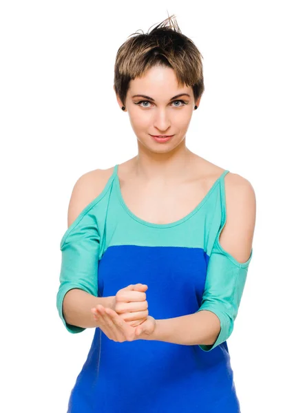 Exited young woman kicks clenched fist arm — Stock Photo, Image